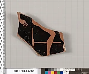 Terracotta fragment of a kylix (drinking cup)