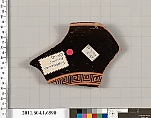 Terracotta fragment of a kylix (drinking cup)
