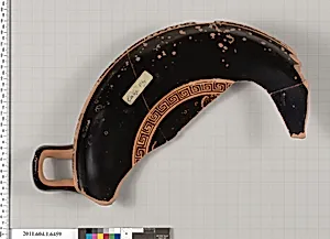 Terracotta fragment of a kylix (drinking cup)