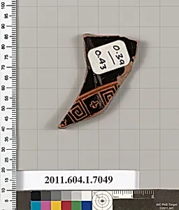 Terracotta fragment of a kylix (drinking cup)