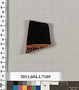 Terracotta fragment of a kylix (drinking cup)
