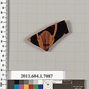 Terracotta fragment of a kylix (drinking cup)