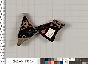 Terracotta fragment of a kylix (drinking cup)