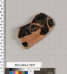 Terracotta fragment of a kylix (drinking cup)