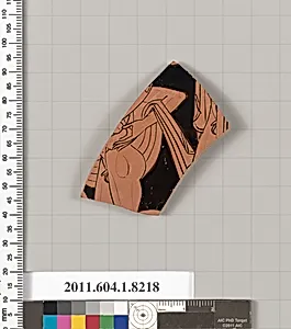 Terracotta fragment of a kylix (drinking cup)