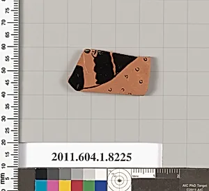 Terracotta fragment of a kylix (drinking cup)