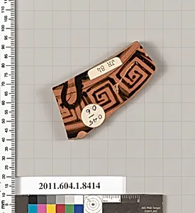Terracotta fragment of a kylix (drinking cup)