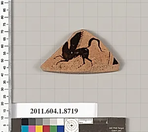 Terracotta fragment of a kylix (drinking cup)