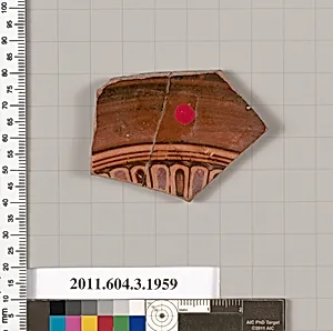 Terracotta fragment of a kylix (drinking cup)