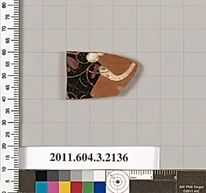 Terracotta fragment of a kylix (drinking cup)