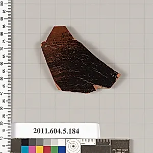 Terracotta fragment of a kylix (drinking cup)