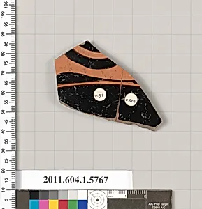 Terracotta fragment of a kylix: eye-cup (drinking cup)
