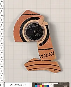 Terracotta fragment of a kylix: eye-cup (drinking cup)? by Unknown Artist
