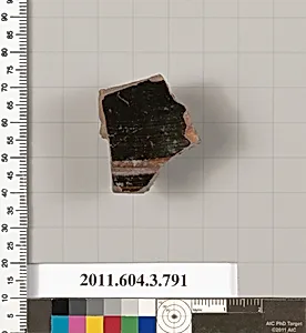 Terracotta fragment of a lid  by Unknown Artist