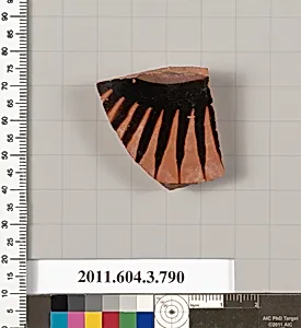 Terracotta fragment of a lid  by Unknown Artist