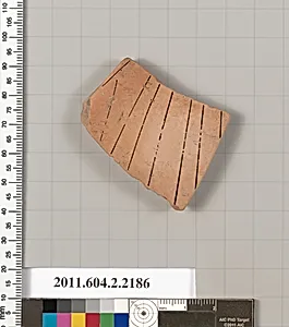Terracotta fragment of a pot; unglazed on the inside by Unknown Artist