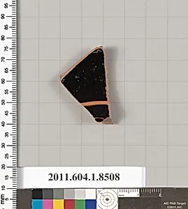 Terracotta fragment of a stemless kylix (drinking cup) by Unknown Artist