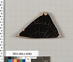 Terracotta fragment of a stemless kylix (drinking cup)