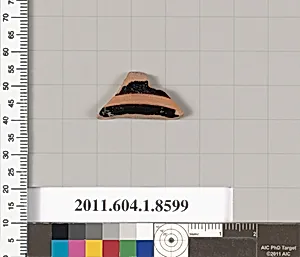 Terracotta fragment of a stemless kylix (drinking cup)