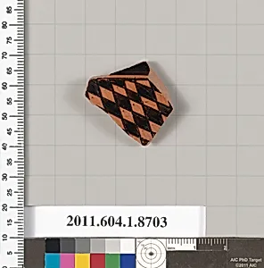 Terracotta fragment of a stemless kylix (drinking cup)
