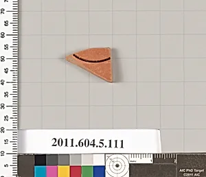 Terracotta fragment of a stemless kylix (drinking cup)