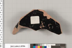 Terracotta fragment of a stemless kylix (drinking cup)