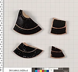 Terracotta fragments of kylikes (drinking cups)