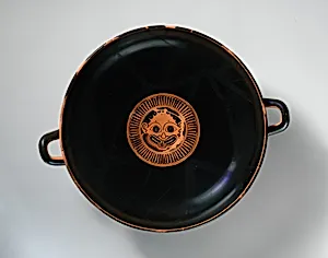 Terracotta kylix: eye-cup (drinking cup) by Nikosthenes