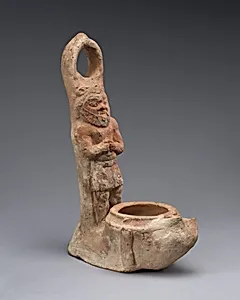 Terracotta lamp representing Bes by Unknown Artist