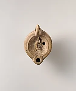 Terracotta oil lamp