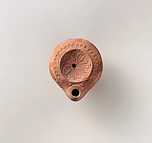 Terracotta oil lamp