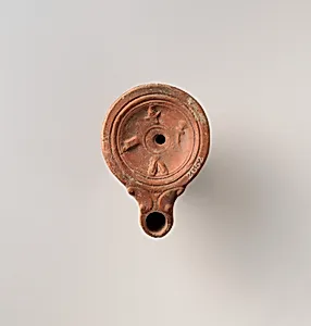 Terracotta oil lamp