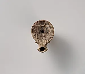 Terracotta oil lamp