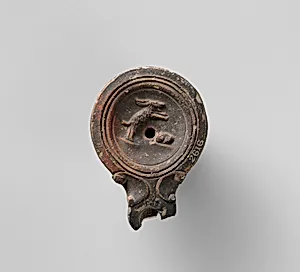 Terracotta oil lamp