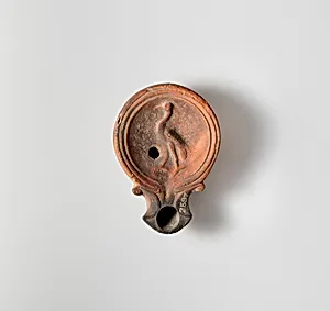 Terracotta oil lamp