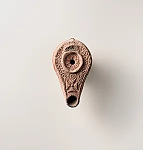 Terracotta oil lamp