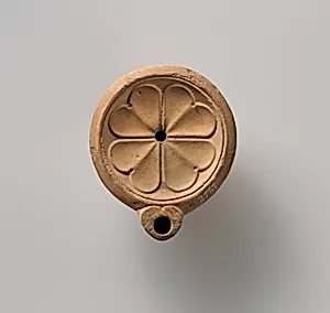 Terracotta oil lamp