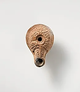 Terracotta oil lamp