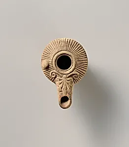 Terracotta oil lamp