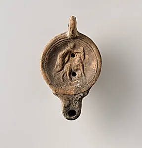 Terracotta oil lamp
