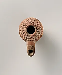 Terracotta oil lamp