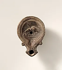 Terracotta oil lamp