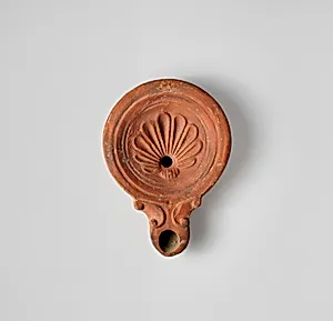 Terracotta oil lamp