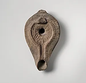 Terracotta oil lamp