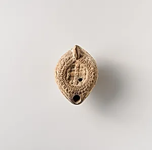 Terracotta oil lamp