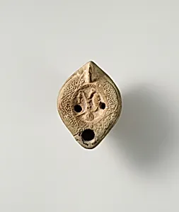 Terracotta oil lamp