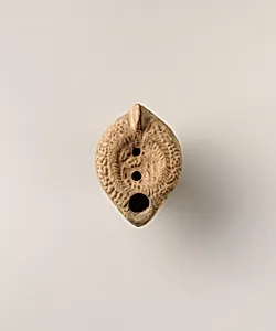 Terracotta oil lamp