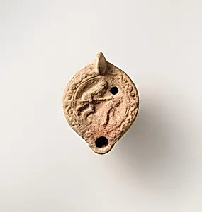 Terracotta oil lamp