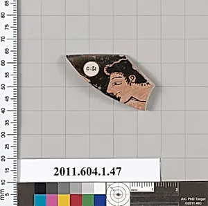 Terracotta rim fragment of a kylix (drinking cup)