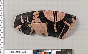 Terracotta rim fragment of a kylix (drinking cup)
